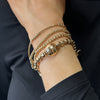 Absolute Set of 4 Noodle Beaded Stacking Bracelets, Gold